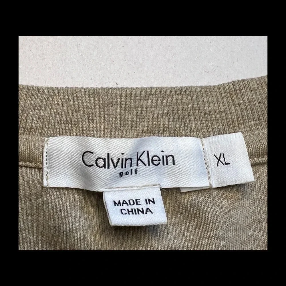 Calvin Klein mens golf sweater vest.  Size XL color Tan so soft.  100% cotton.